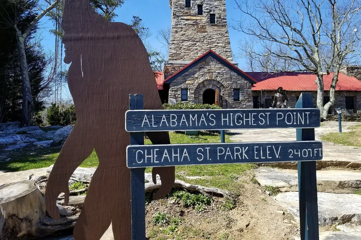 Scenic rocky summit view from Cheaha Mountain, Alabama, overlooking forested ridgelines