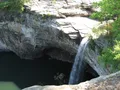 Scenic view at DeSoto State Park, Alabama, featuring lush forest and a cascading waterfall on Lookout Mountain