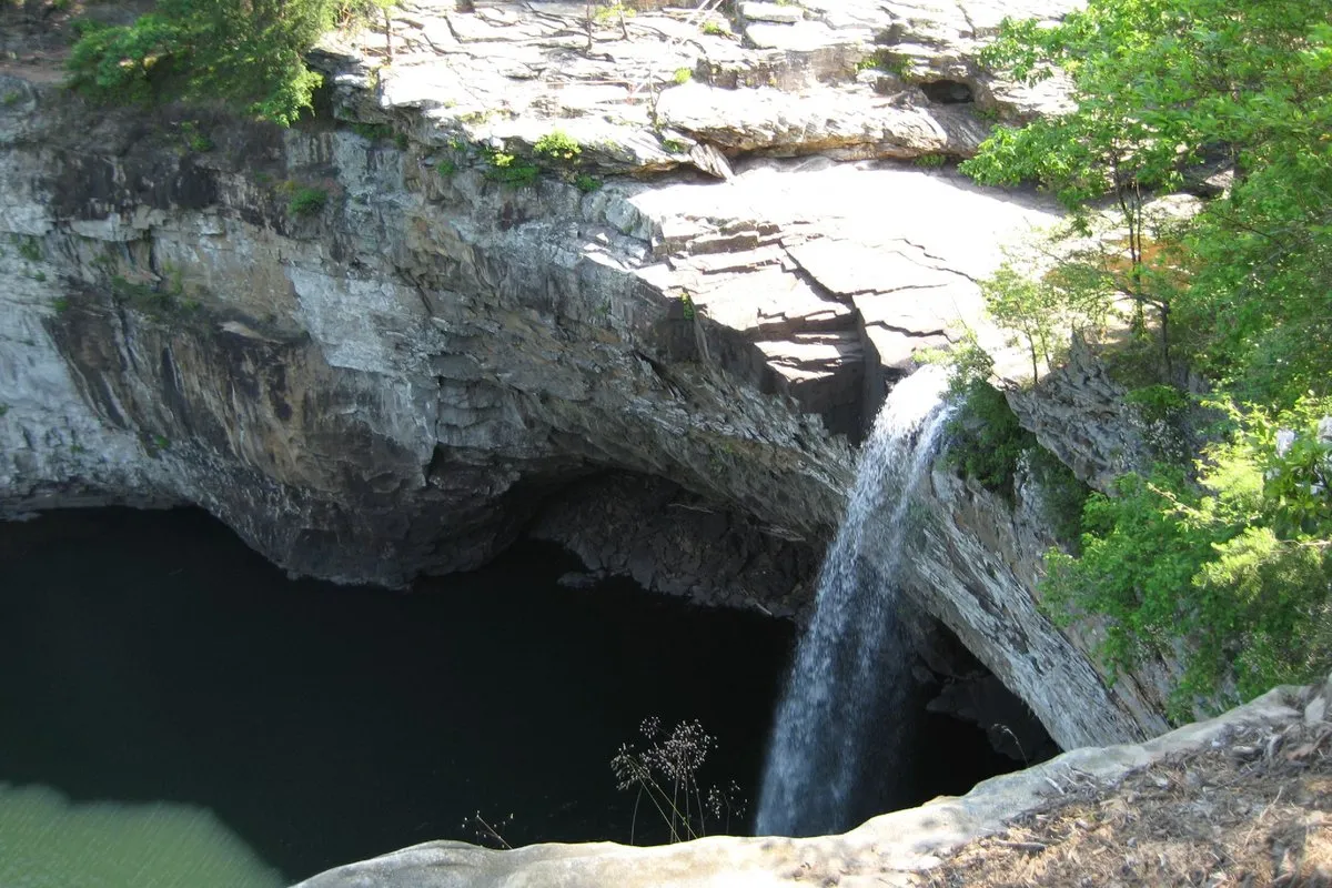 Scenic view at DeSoto State Park, Alabama, featuring lush forest and a cascading waterfall on Lookout Mountain