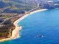 Scenic coastal view at Crystal Cove State Park, California, with rocky shoreline and Pacific Ocean waves