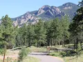 Scenic view of forested rocky terrain and open meadows at Staunton State Park, Colorado