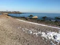 Scenic view of the sandy beach and calm waters at Hammonasset Beach State Park, Connecticut