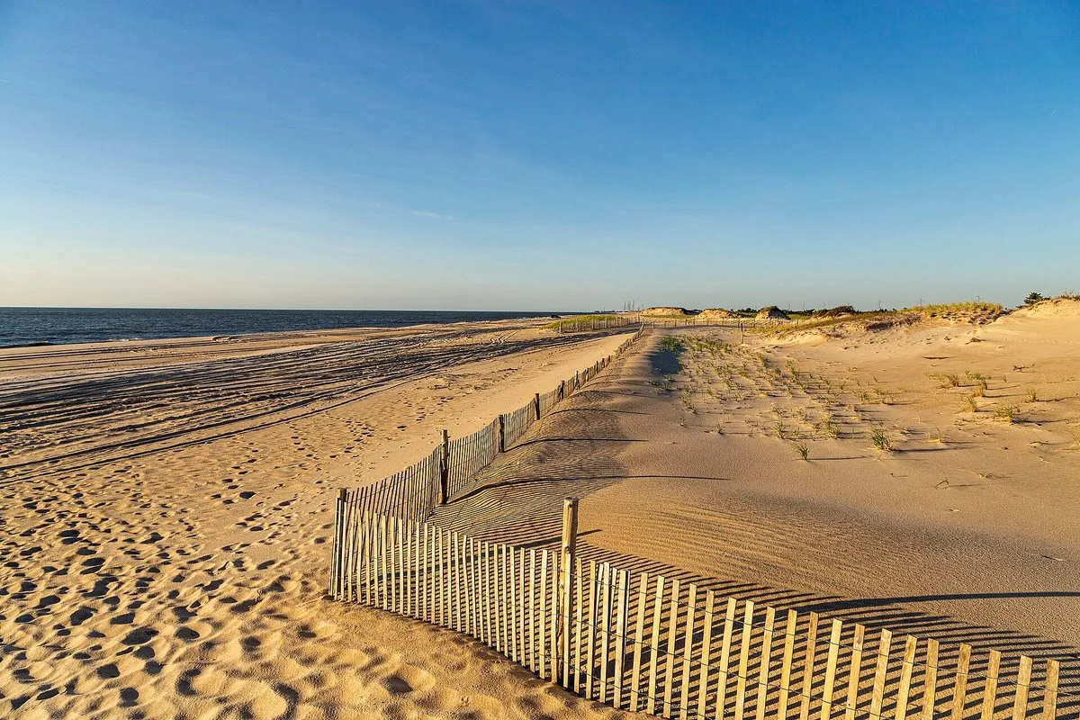 Scenic view of the Atlantic Ocean shoreline and sandy beach at Delaware Seashore State Park, Delaware