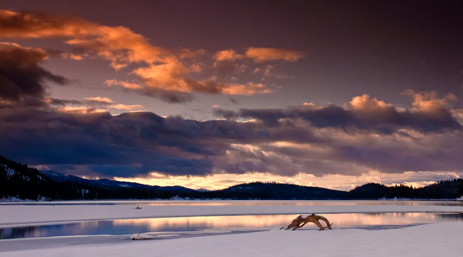 Winter sunrise at the north shore of Payette Lake in Ponderosa State Park, Idaho.