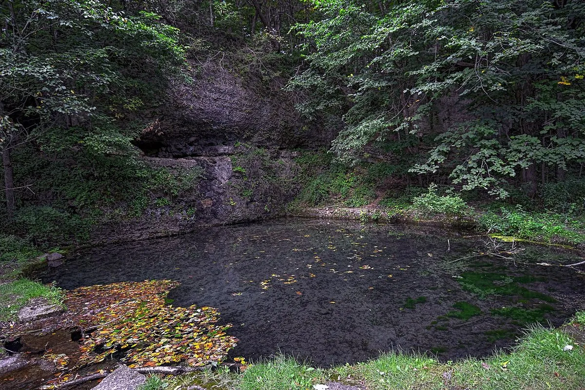 Scenic view of the rugged dolomite ridge and forested river valley at Backbone State Park, Iowa