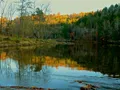 Scenic view of Lake Cumberland's calm blue waters framed by forested hillsides, Kentucky