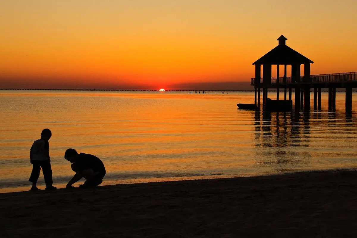 Scenic view at Fontainebleau State Park, Louisiana, with oak trees and Lake Pontchartrain shoreline
