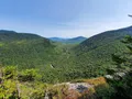 Scenic view of the forested notch and rocky gorge at Grafton Notch State Park, Maine