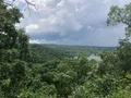 Scenic view of Ha Ha Tonka State Park, Missouri, with stone castle ruins overlooking a wooded karst landscape and Lake of the Ozarks