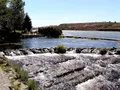 Crystal-clear spring waters flowing from Giant Springs into the Missouri River at Giant Springs State Park, Montana