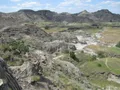 Sweeping view of rugged badlands terrain and eroded rock formations at Makoshika State Park, Montana