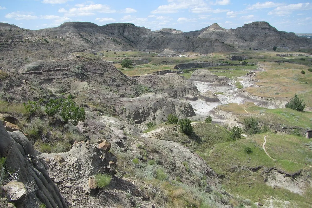 Sweeping view of rugged badlands terrain and eroded rock formations at Makoshika State Park, Montana