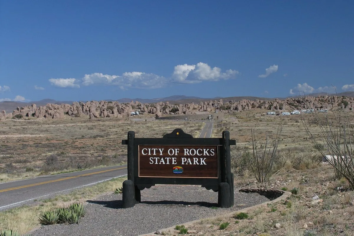 Scenic view of towering volcanic rock formations rising from the desert landscape at City of Rocks State Park, New Mexico