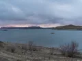 Scenic view of Elephant Butte Lake with blue water and arid desert shoreline, New Mexico
