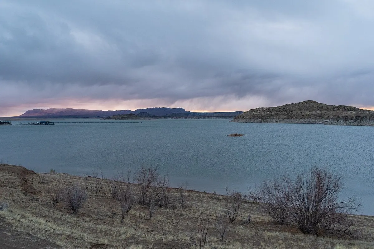 Scenic view of Elephant Butte Lake with blue water and arid desert shoreline, New Mexico