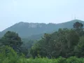 Scenic view from the rocky summit of Crowders Mountain looking out over forested hills in North Carolina