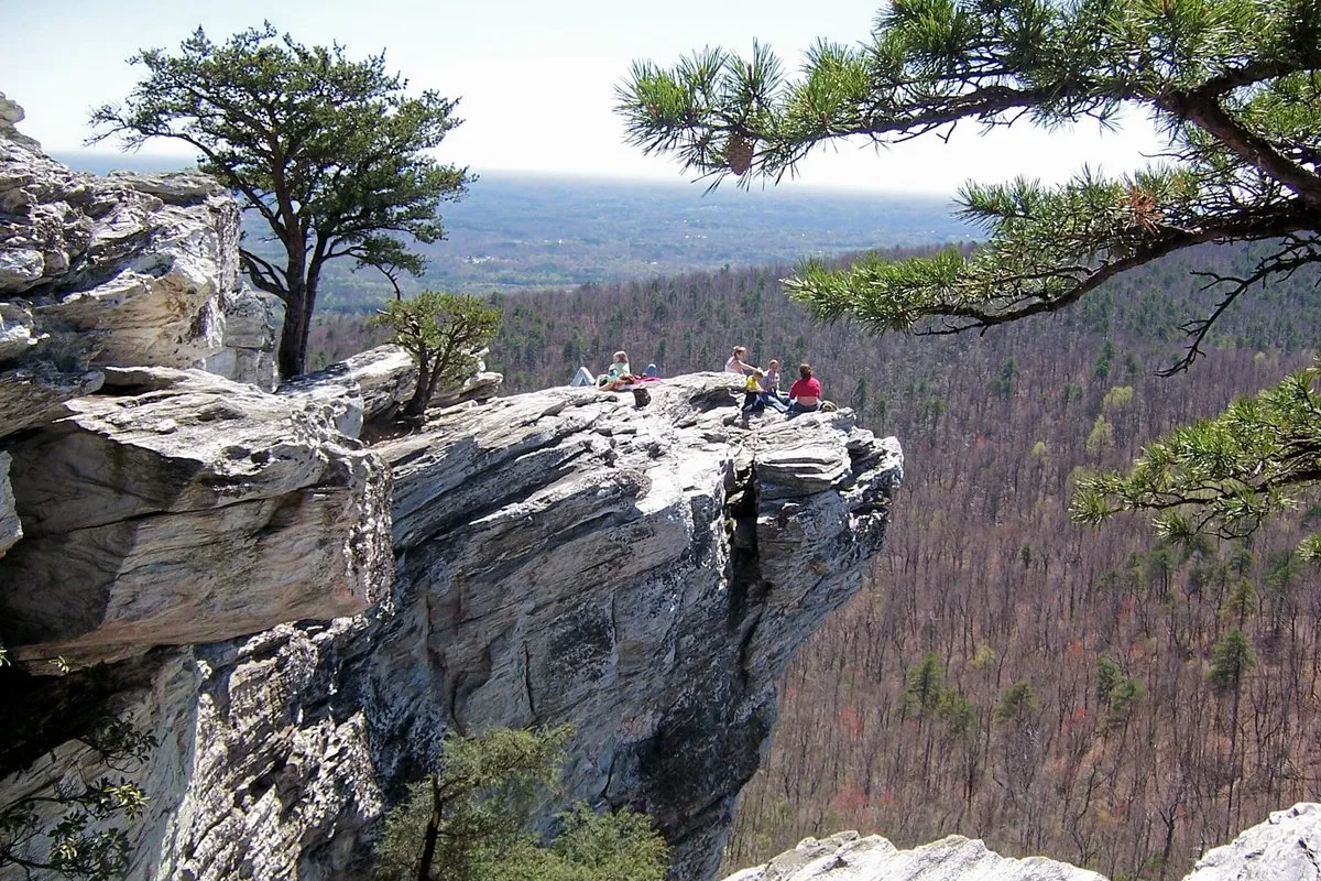 Rocky summit outcrop with sweeping forested valley views at Hanging Rock State Park, North Carolina