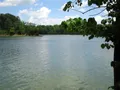 Scenic lake view at Caesar Creek State Park, Ohio, with forested shoreline and calm water