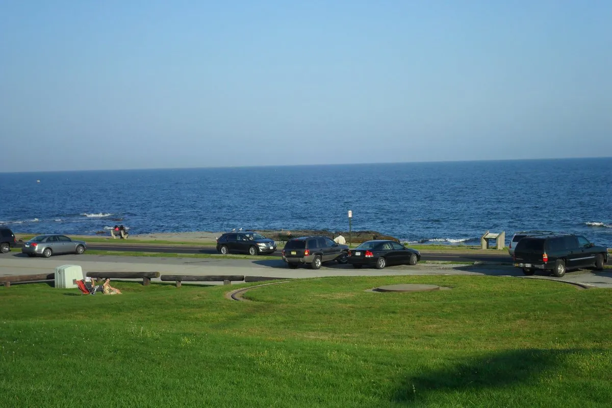 Scenic coastal view at Brenton Point State Park, Newport, Rhode Island, with rocky Atlantic shoreline and ocean horizon