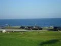 Scenic coastal view at Brenton Point State Park, Newport, Rhode Island, with rocky Atlantic shoreline and ocean horizon