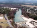 Scenic view of the Frio River and tree-lined banks at Garner State Park, Texas