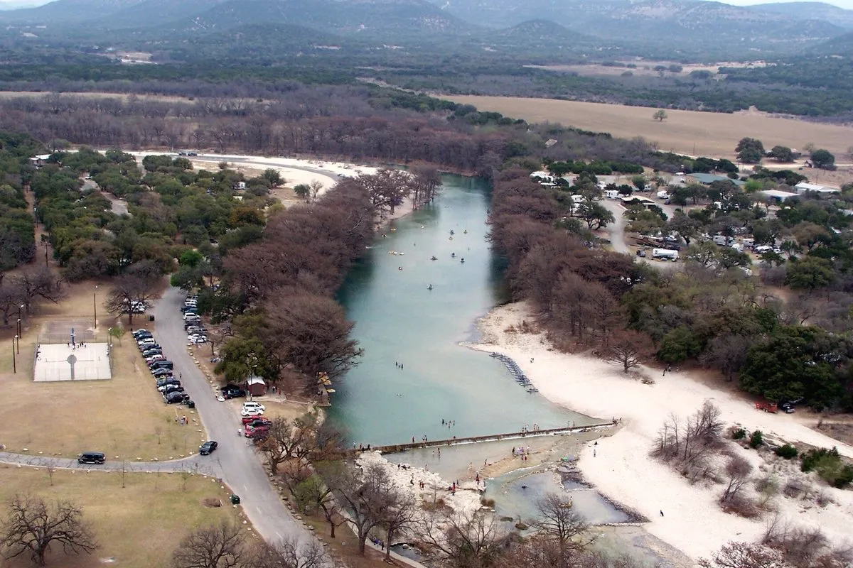 Scenic view of the Frio River and tree-lined banks at Garner State Park, Texas