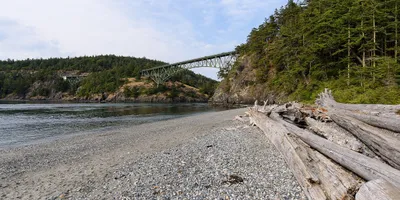 Scenic view of the Deception Pass Bridge spanning the rocky gorge between Whidbey Island and Fidalgo Island, Washington