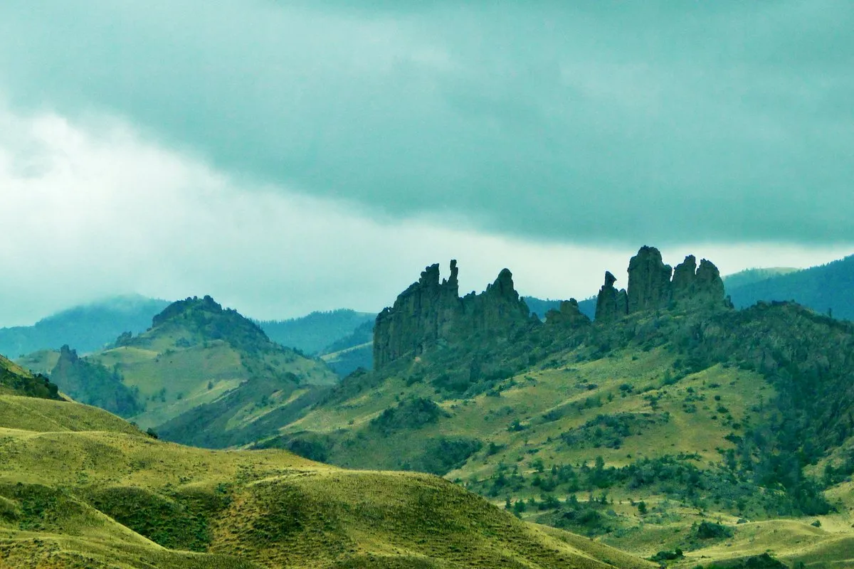 Scenic view of Buffalo Bill Reservoir with rugged canyon walls and mountain backdrop, Wyoming