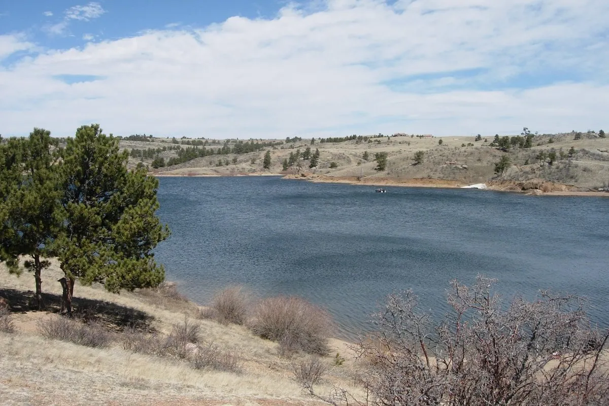 Rocky granite formations and reservoir waters at Curt Gowdy State Park, Wyoming